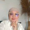Yusmaini S. Pd